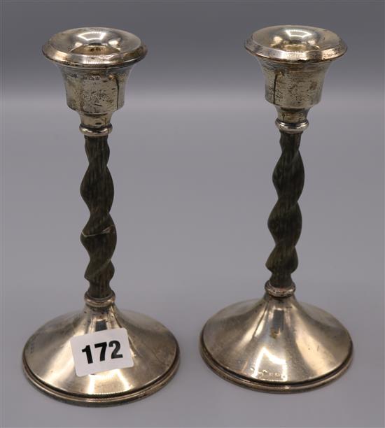 Pair George V silver and bone? candlesticks, cased(-)